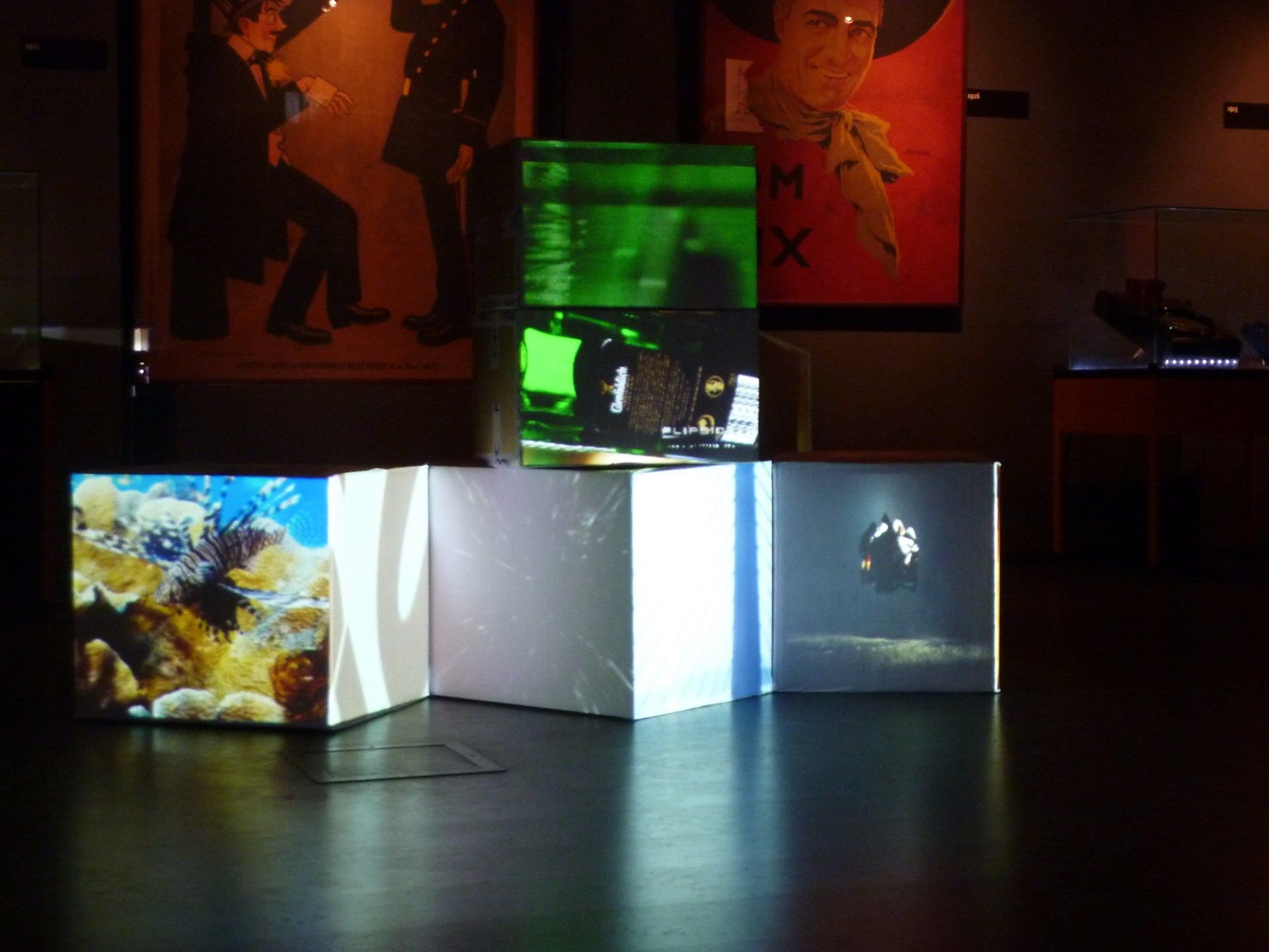 FaçadeSignage projection mapping with a single normal projector on some cardboard cubes.