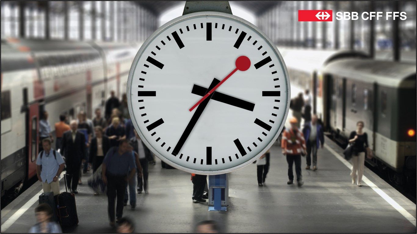 The clock at Lucerne station with the second hand stationary as the minute hand ticks on