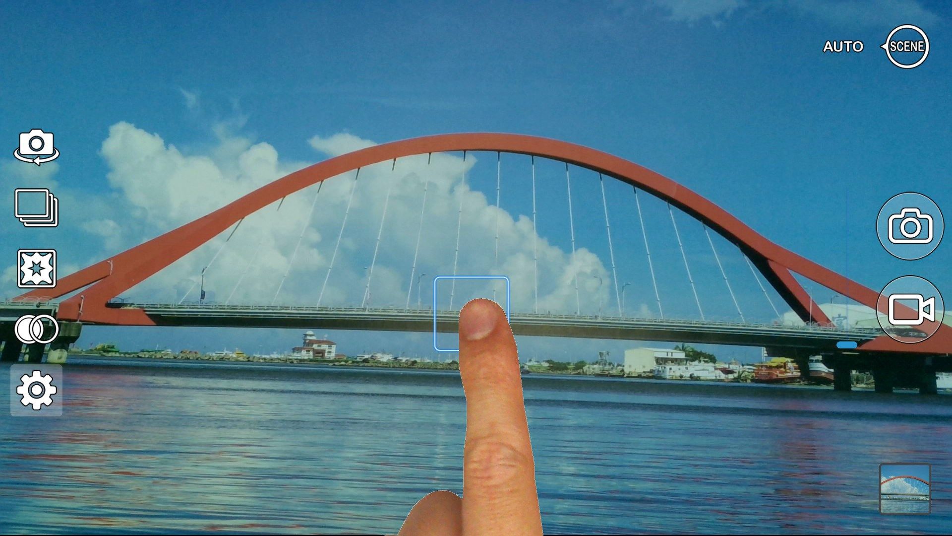 Use your finger to select the exposure and focus target, need camera support. The figure of finger part is added additionally to be  a schematic for user operating.