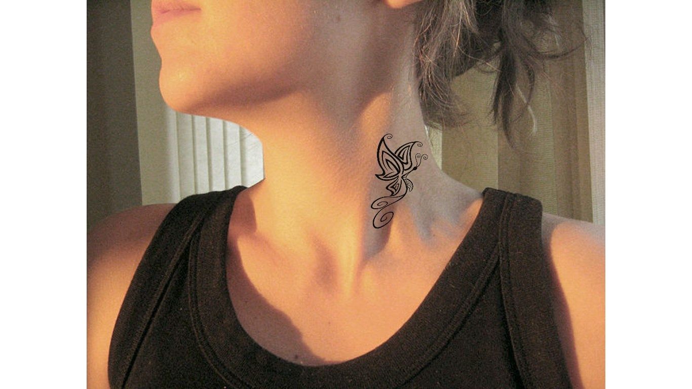 Neck Butterfly Tattoo! It looks almost real!