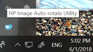 You can find the HP Image Auto-Rotate utility in the Windows Task Tray. Look for the blue and white icon.